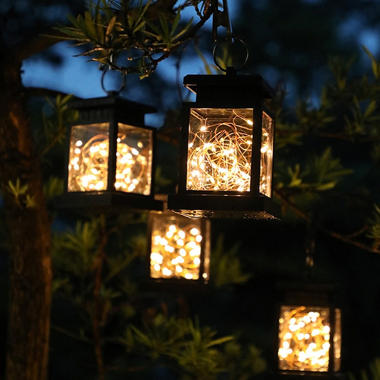 Image of (13x9cm) LED Solar Lampe Outdoor Laterne Gartenleuchte Spritzwassergeschützt IPX4 - Lichterkette (Warmweiss) bei Apfelkiste.ch