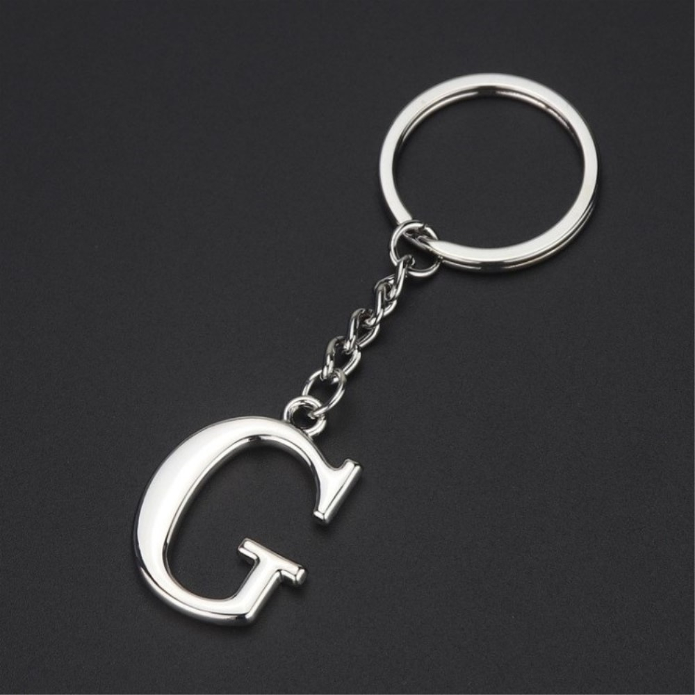 Image of Metall Buchstaben Schlüsselanhänger Accessoire mit Spaltring - Silber / G bei Apfelkiste.ch